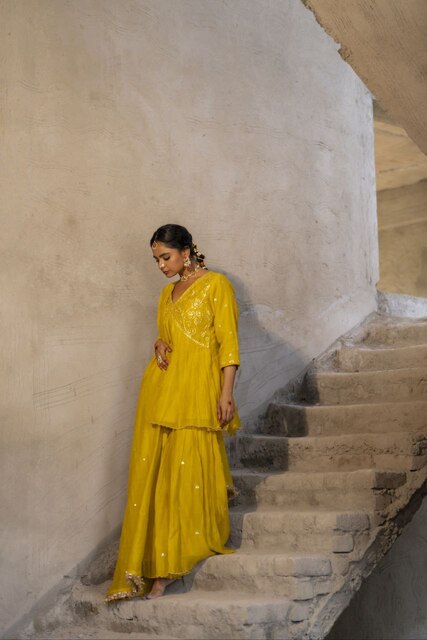 Yellow Mul Chanderi Peplum Sharara with Dabka Pittan work