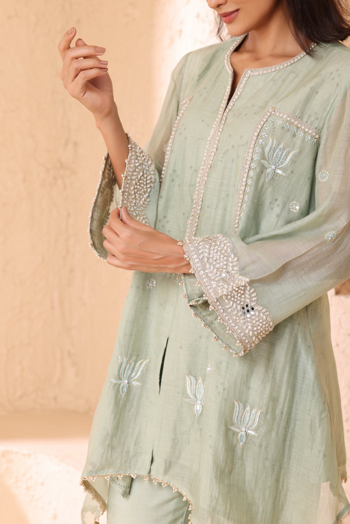 Asymmetrical short length shirt with narrow salwar