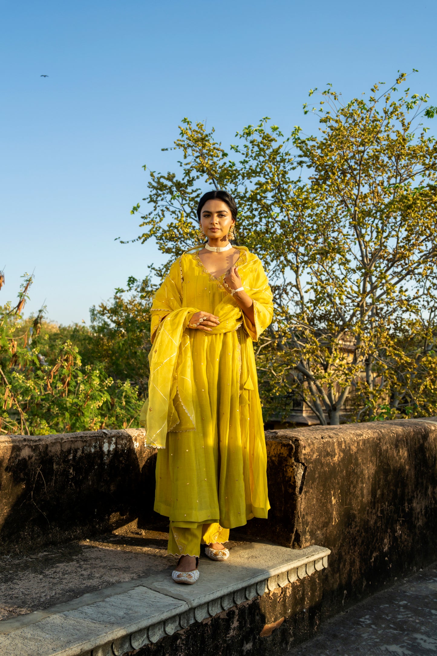 Yellow Chanderi Angrakha set with Dabka work