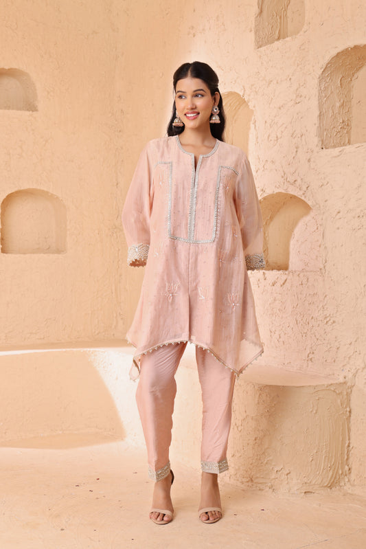 Asymmetrical short length shirt with narrow salwar